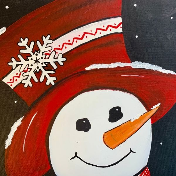 Snowman with stenciled snowflake and added details